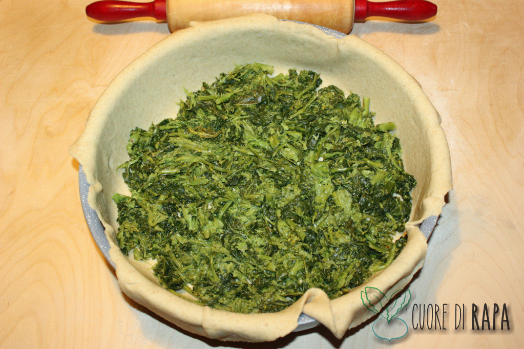 torta salata alle cime di rapa - versare le cime di rapa